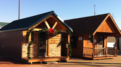 A picture of the exterior of 2 wilderness brown wilderness cabins